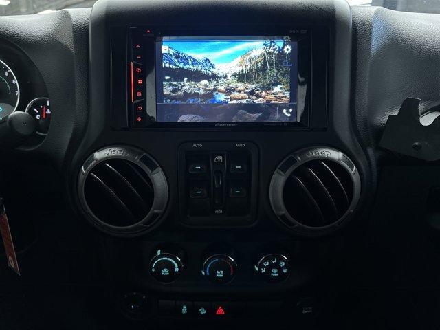 used 2013 Jeep Wrangler Unlimited car, priced at $12,600
