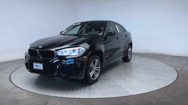 used 2019 BMW X6 car, priced at $26,900