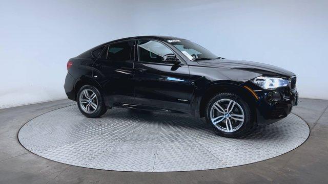 used 2019 BMW X6 car, priced at $26,900