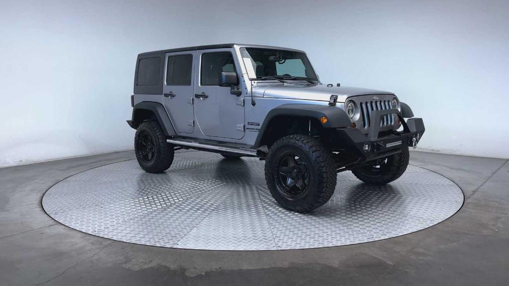 used 2018 Jeep Wrangler JK Unlimited car, priced at $20,974