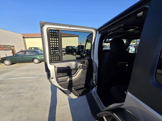 used 2014 Jeep Wrangler Unlimited car, priced at $20,995