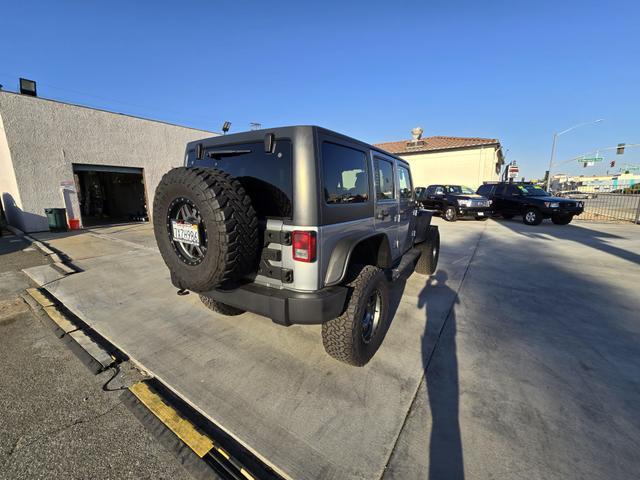 used 2014 Jeep Wrangler Unlimited car, priced at $20,995