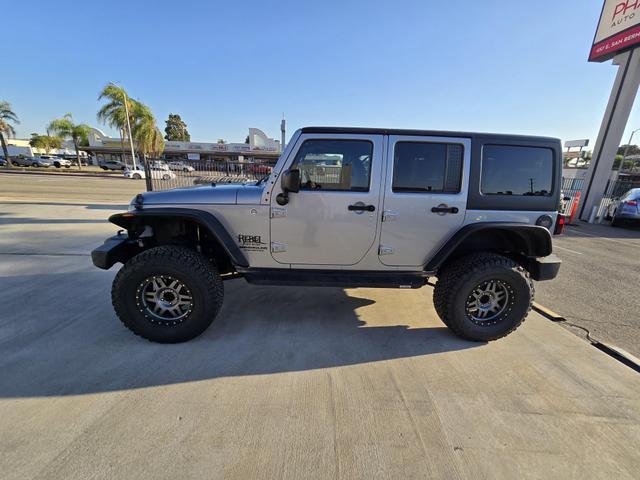 used 2014 Jeep Wrangler Unlimited car, priced at $20,995