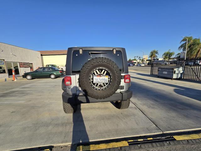 used 2014 Jeep Wrangler Unlimited car, priced at $20,995