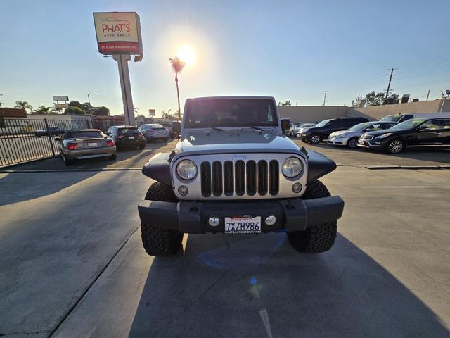 used 2014 Jeep Wrangler Unlimited car, priced at $20,995