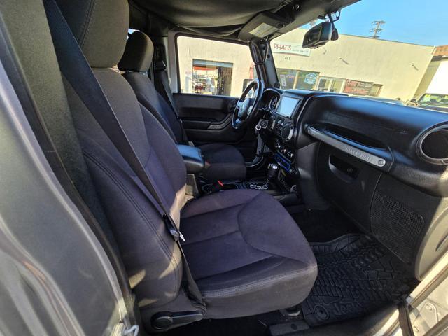 used 2014 Jeep Wrangler Unlimited car, priced at $20,995