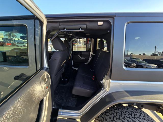 used 2014 Jeep Wrangler Unlimited car, priced at $20,995