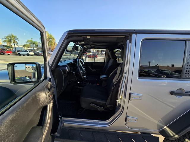 used 2014 Jeep Wrangler Unlimited car, priced at $20,995