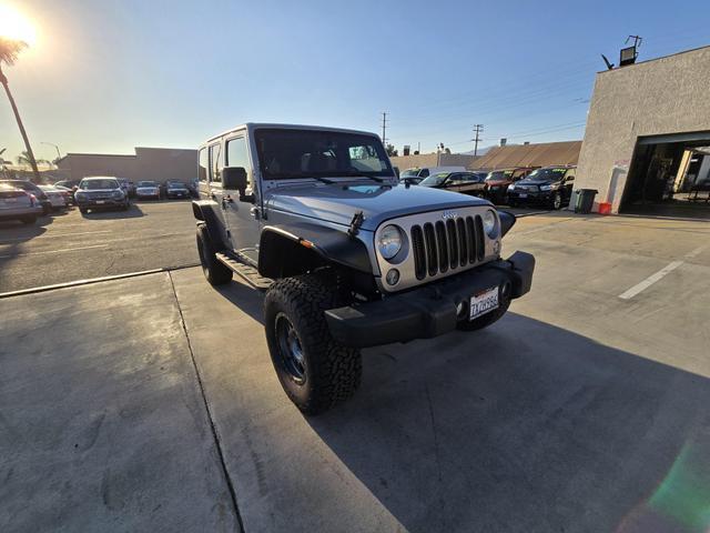 used 2014 Jeep Wrangler Unlimited car, priced at $20,995