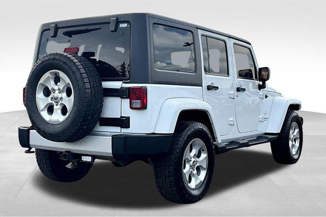 used 2015 Jeep Wrangler Unlimited car, priced at $18,640