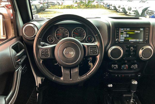 used 2015 Jeep Wrangler Unlimited car, priced at $18,640