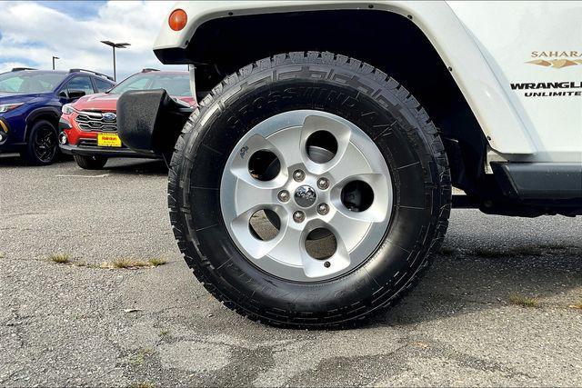 used 2015 Jeep Wrangler Unlimited car, priced at $18,640