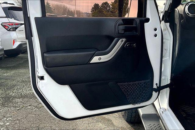 used 2015 Jeep Wrangler Unlimited car, priced at $18,640