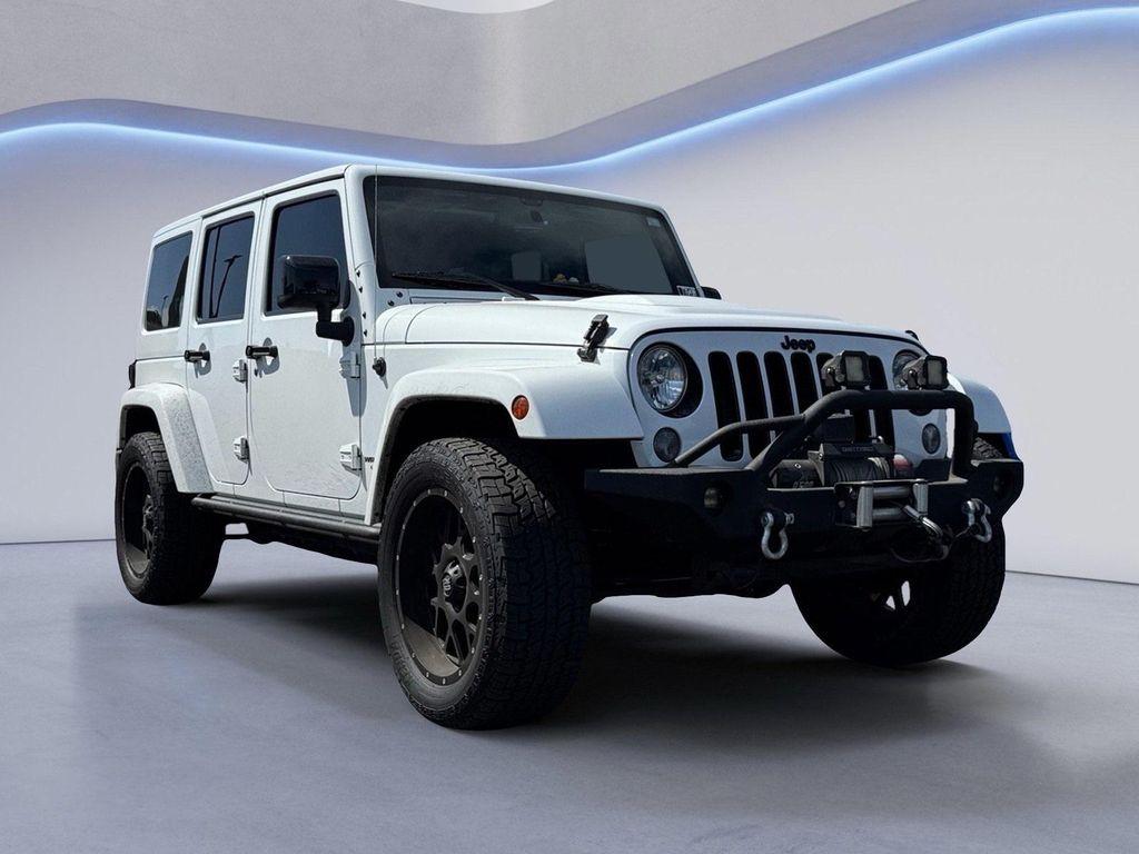 used 2015 Jeep Wrangler Unlimited car, priced at $23,997