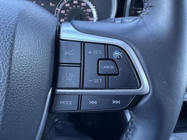 used 2024 Toyota Highlander Hybrid car, priced at $44,898