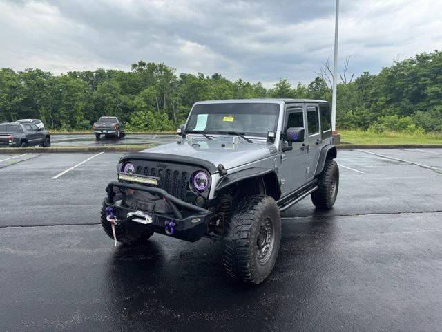 used 2014 Jeep Wrangler Unlimited car, priced at $15,968