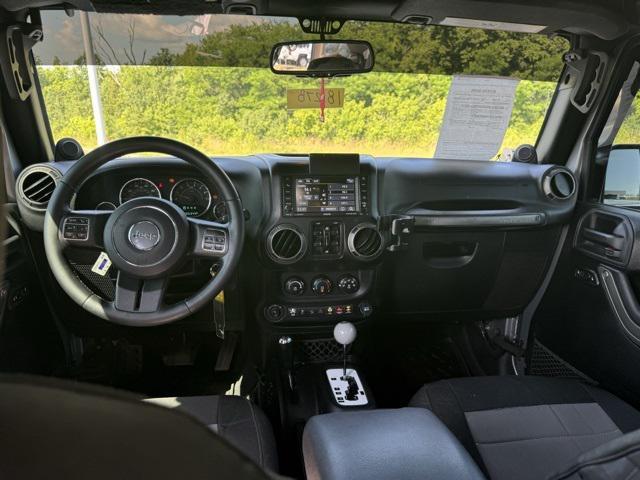 used 2014 Jeep Wrangler Unlimited car, priced at $15,681