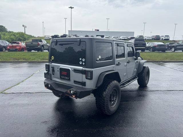 used 2014 Jeep Wrangler Unlimited car, priced at $15,968