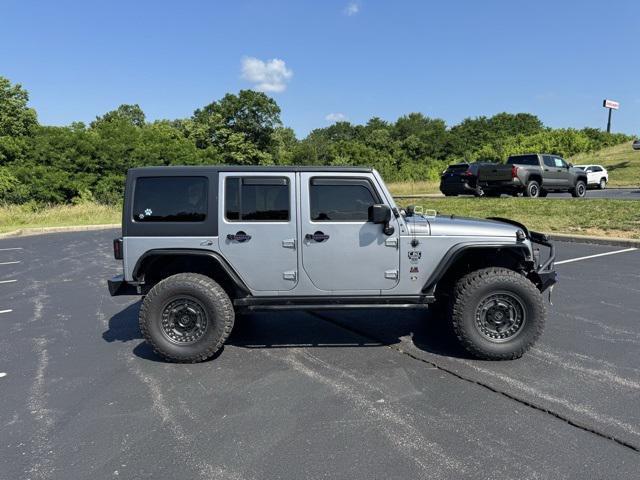 used 2014 Jeep Wrangler Unlimited car, priced at $15,681