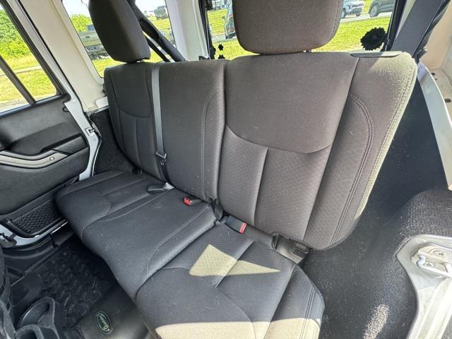 used 2014 Jeep Wrangler Unlimited car, priced at $15,681