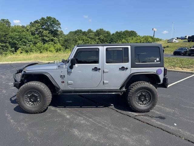 used 2014 Jeep Wrangler Unlimited car, priced at $15,681
