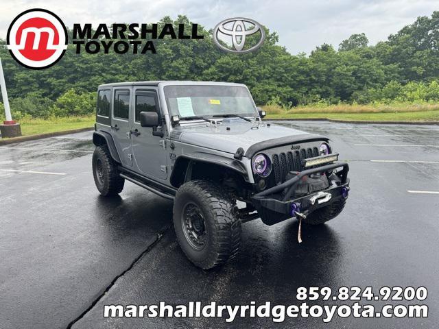 used 2014 Jeep Wrangler Unlimited car, priced at $15,968