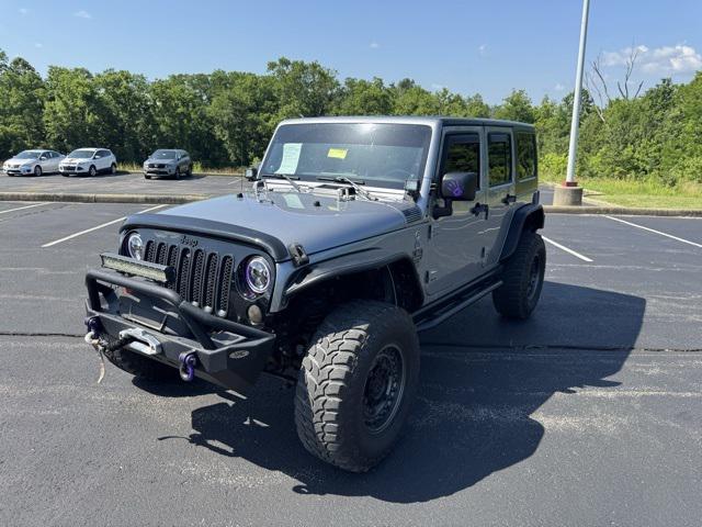 used 2014 Jeep Wrangler Unlimited car, priced at $15,681