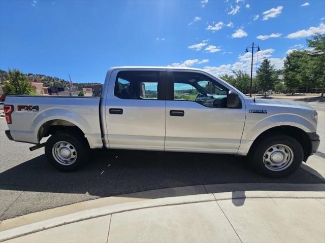 used 2019 Ford F-150 car, priced at $27,412