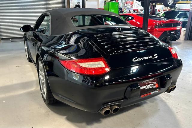 used 2009 Porsche 911 car, priced at $54,999