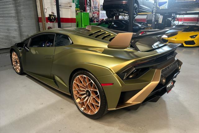 used 2022 Lamborghini Huracan STO car, priced at $359,999