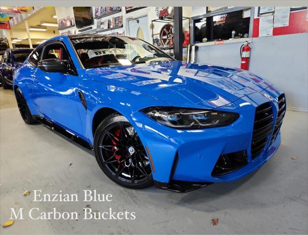 used 2022 BMW M4 car, priced at $80,999