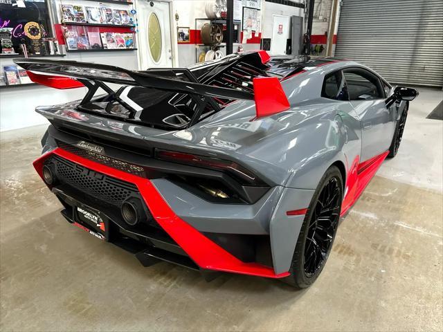 used 2022 Lamborghini Huracan STO car, priced at $379,999