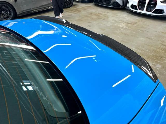 used 2025 BMW M4 car, priced at $139,999