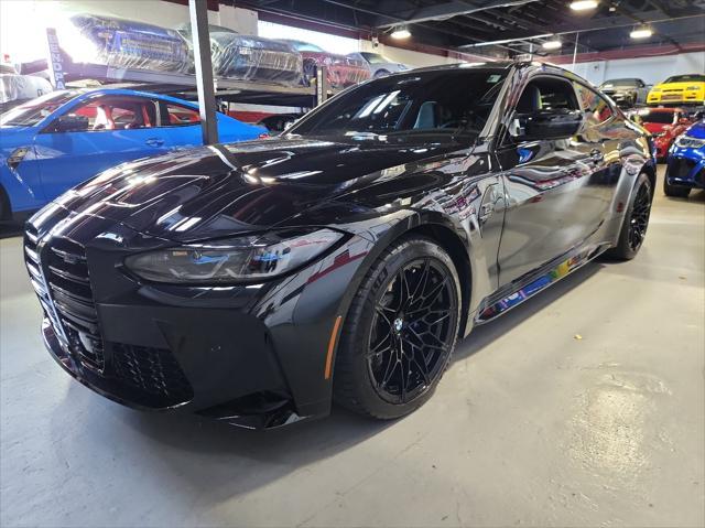 used 2024 BMW M4 car, priced at $91,999