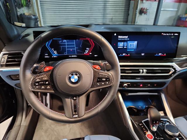 used 2024 BMW M4 car, priced at $91,999