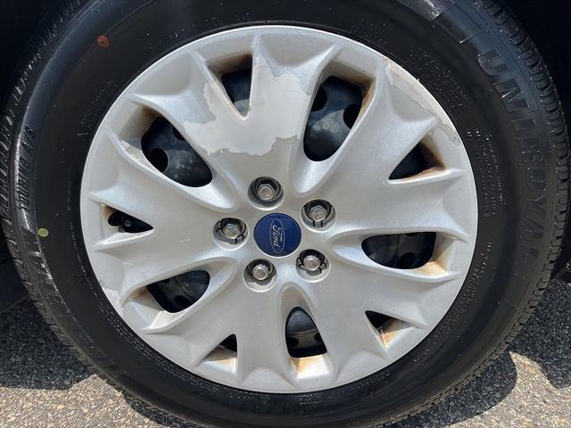 used 2014 Ford Fusion car, priced at $7,000