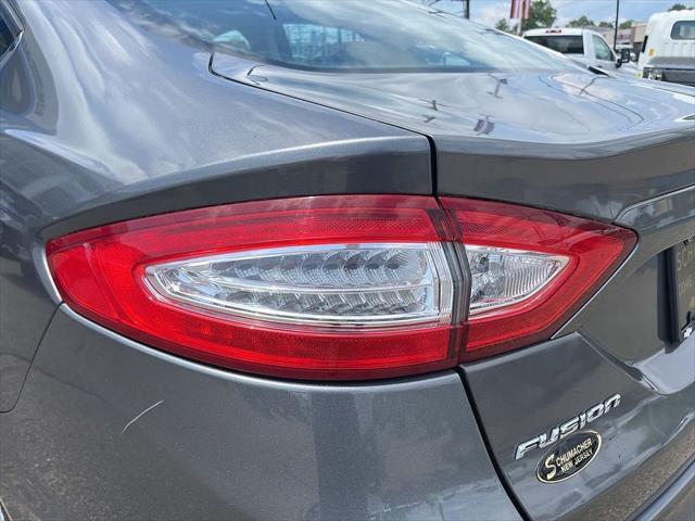 used 2014 Ford Fusion car, priced at $7,000