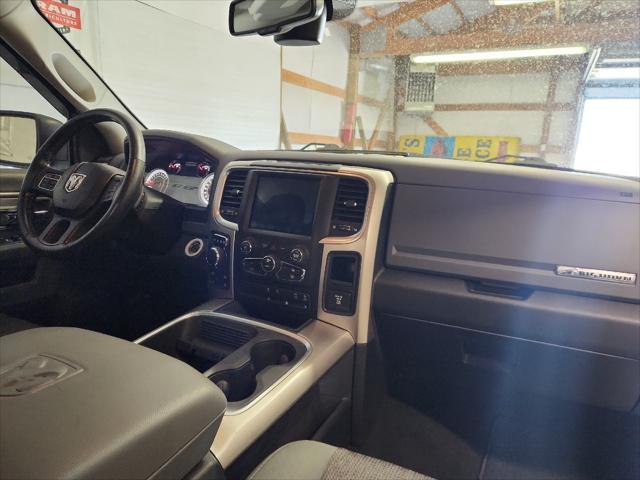 used 2018 Ram 1500 car, priced at $25,613