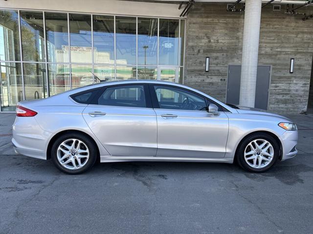 used 2016 Ford Fusion car, priced at $7,495