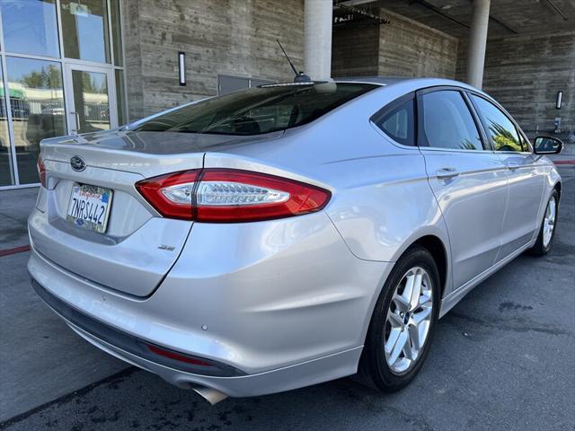 used 2016 Ford Fusion car, priced at $7,495