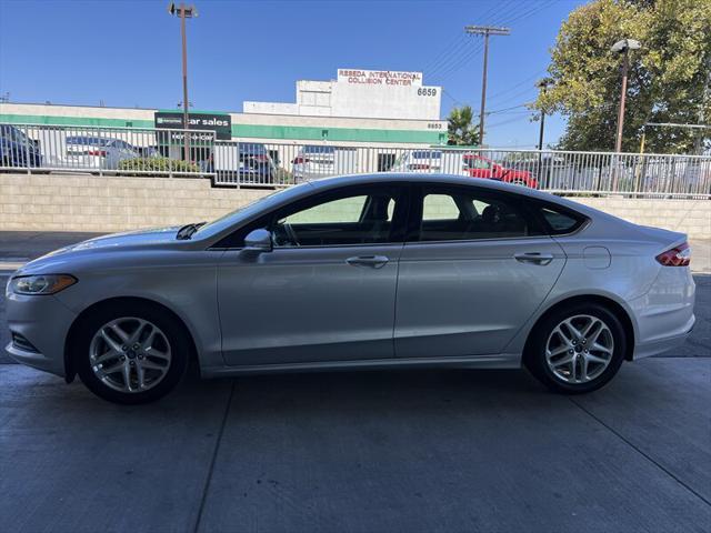 used 2016 Ford Fusion car, priced at $7,495
