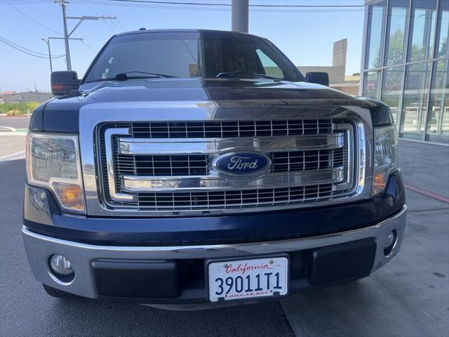 used 2014 Ford F-150 car, priced at $12,498