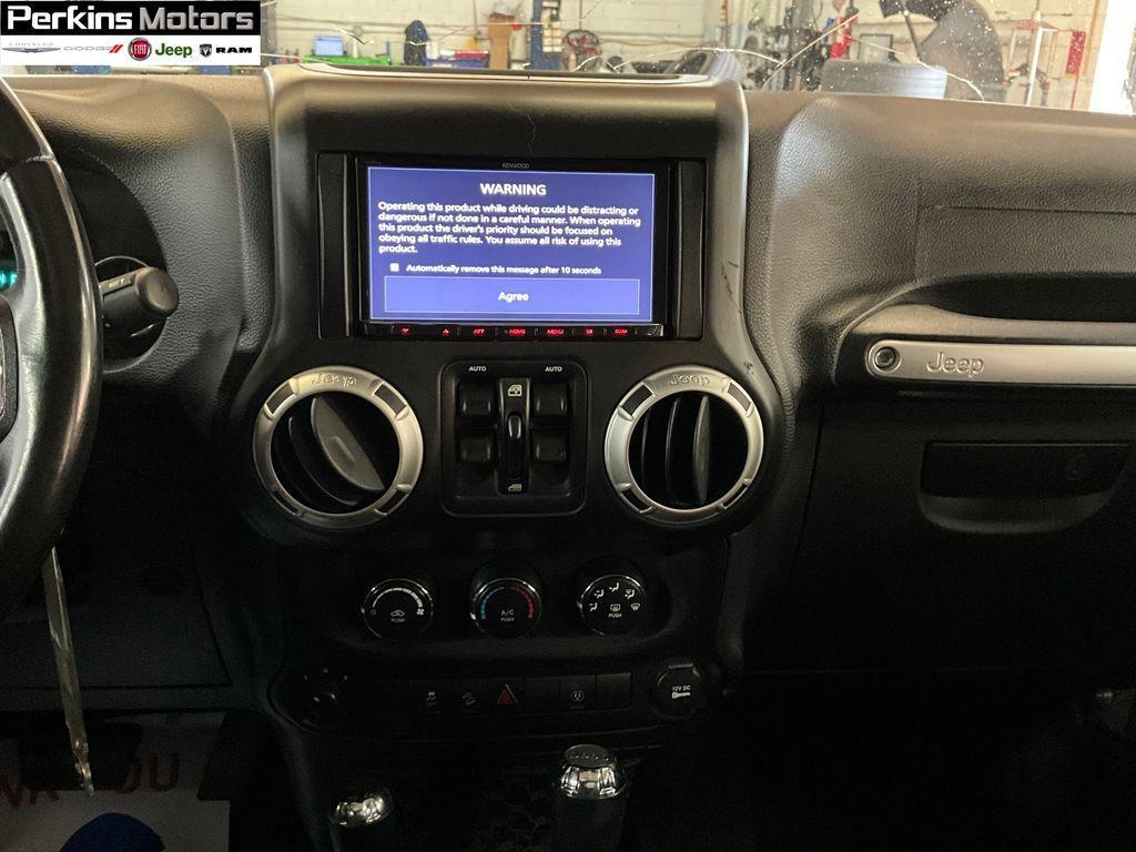 used 2018 Jeep Wrangler JK Unlimited car, priced at $21,194