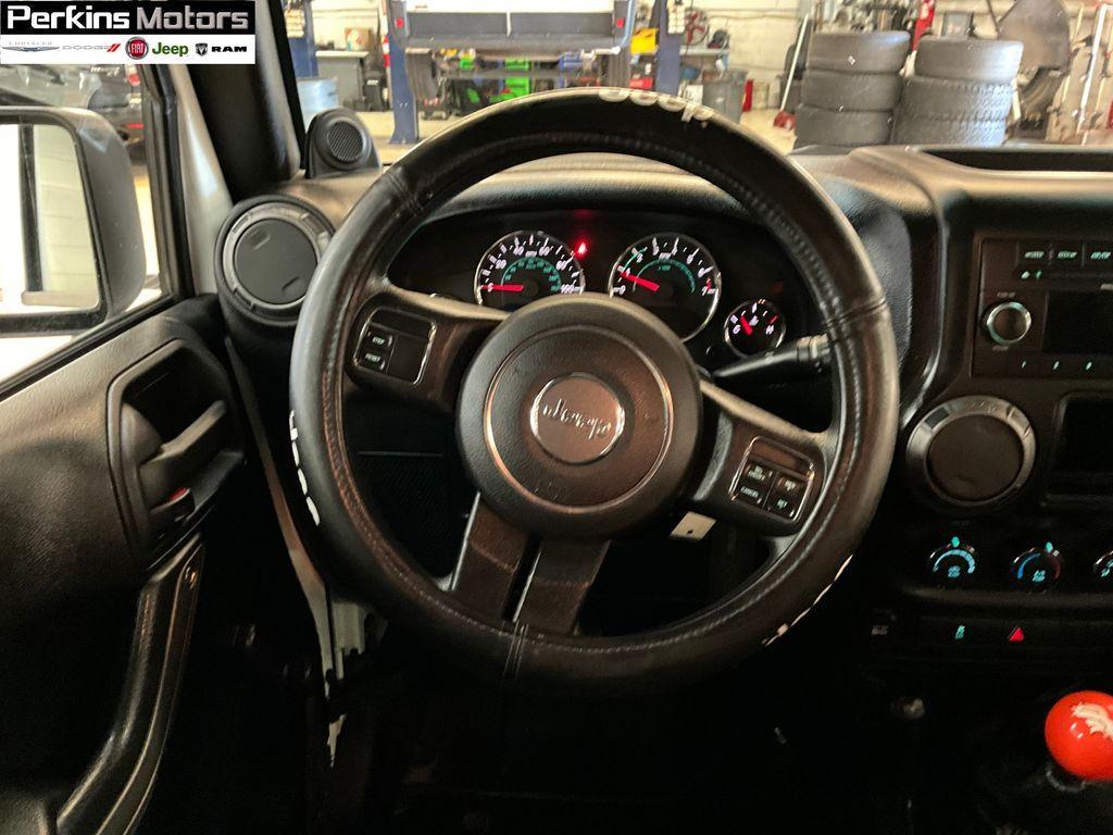 used 2012 Jeep Wrangler Unlimited car, priced at $19,278