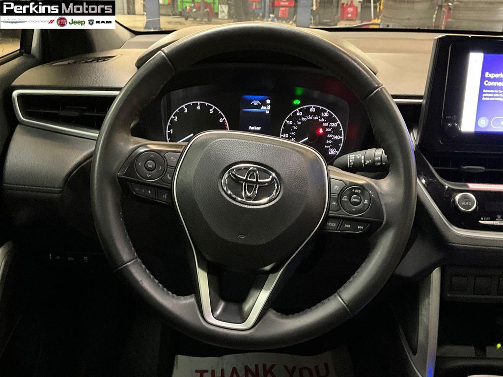 used 2024 Toyota Corolla Cross Hybrid car, priced at $30,177