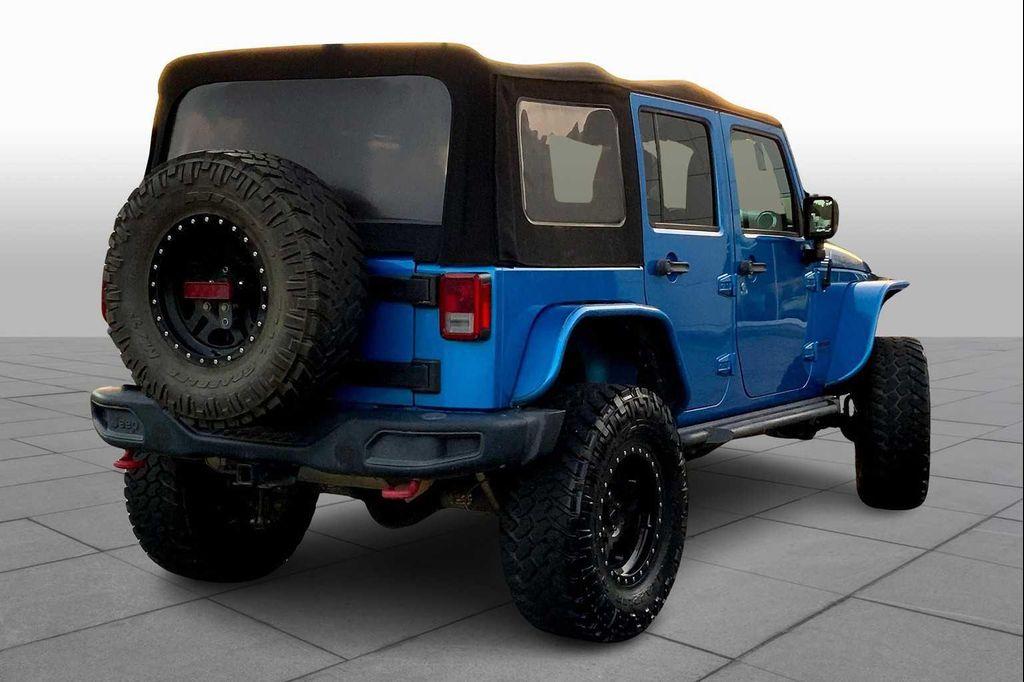used 2016 Jeep Wrangler Unlimited car, priced at $21,834