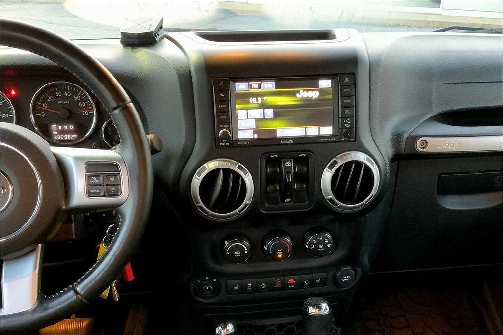 used 2016 Jeep Wrangler Unlimited car, priced at $21,834