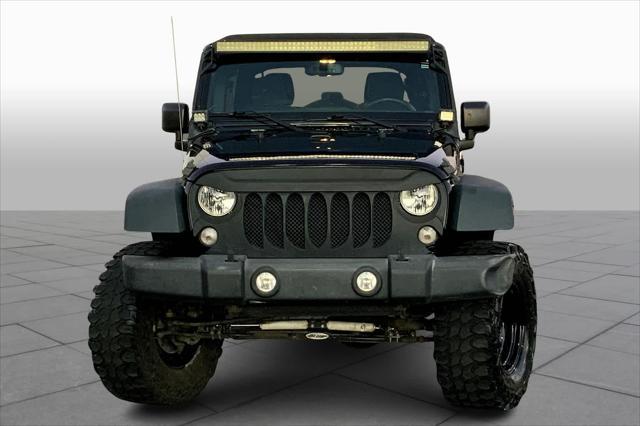 used 2018 Jeep Wrangler JK Unlimited car, priced at $23,026