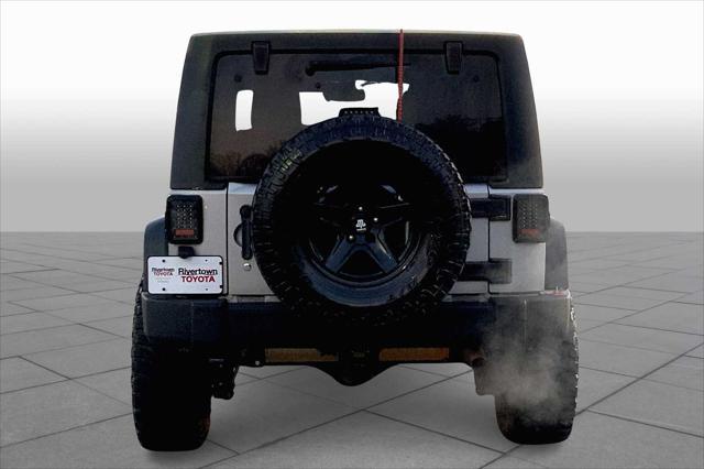 used 2013 Jeep Wrangler Unlimited car, priced at $16,745