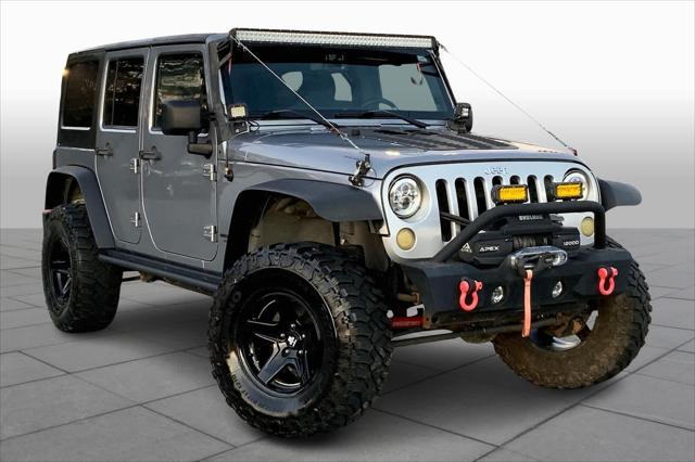 used 2013 Jeep Wrangler Unlimited car, priced at $16,745